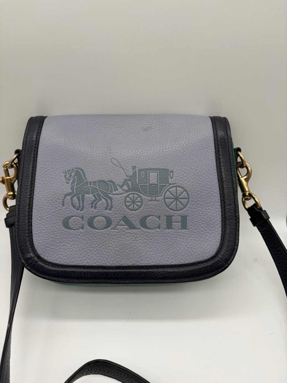 Coach Colorblock Saddle Bag in Navy and Green.